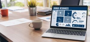 Human resources software on computer screen help employee manage people snugly