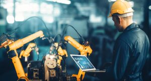 XAI Smart industry robot arms for digital factory production technology showing automation manufacturing process of the Industry 4.0 or 4th industrial revolution and IOT software to control operation.